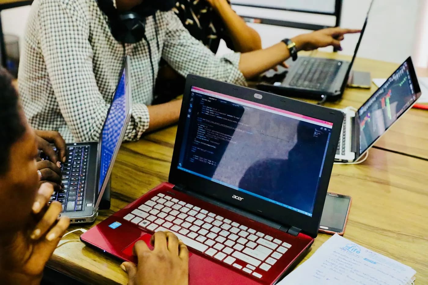 Operations team working on laptops