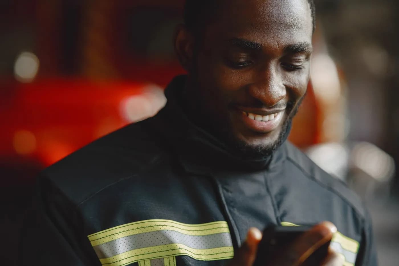 Worker checking his wages on his phone